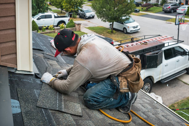 Professional Roofing technician working in Clark Mills, NY